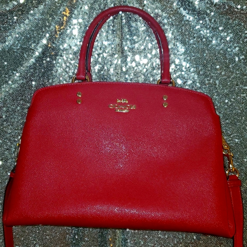 RED LEATHER PURSE BY COACH